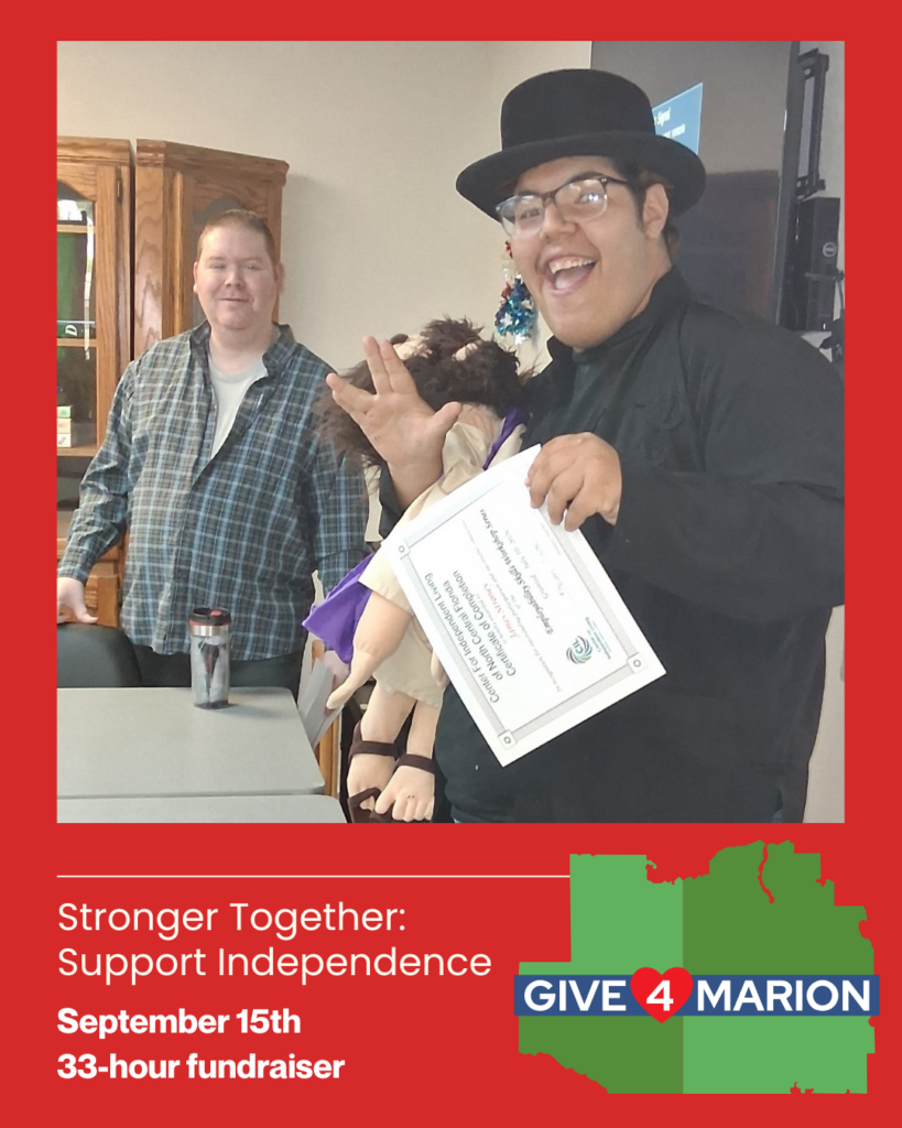 ID: A Give4Marion fundraising graphic featuring a photo of James smiling and holding his Pre-Placement Training completion certificate and a puppet, with his Job Readiness Skills Trainer standing beside him. The graphic has a red background with white text reading, “Stronger Together: Support Independence,” followed by “September 15th” and “33-hour fundraiser.” The Give4Marion logo appears in the lower right over a green silhouette of Marion County.